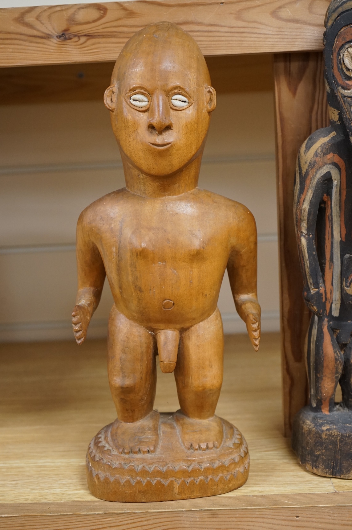 Three wood tribal figures, Africa, South Seas, tallest 37.5cm